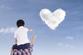 father-son-watch-heart-clouds-29033461